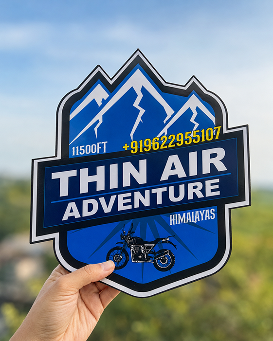 Custom-cut magnetic sticker following a logo shape